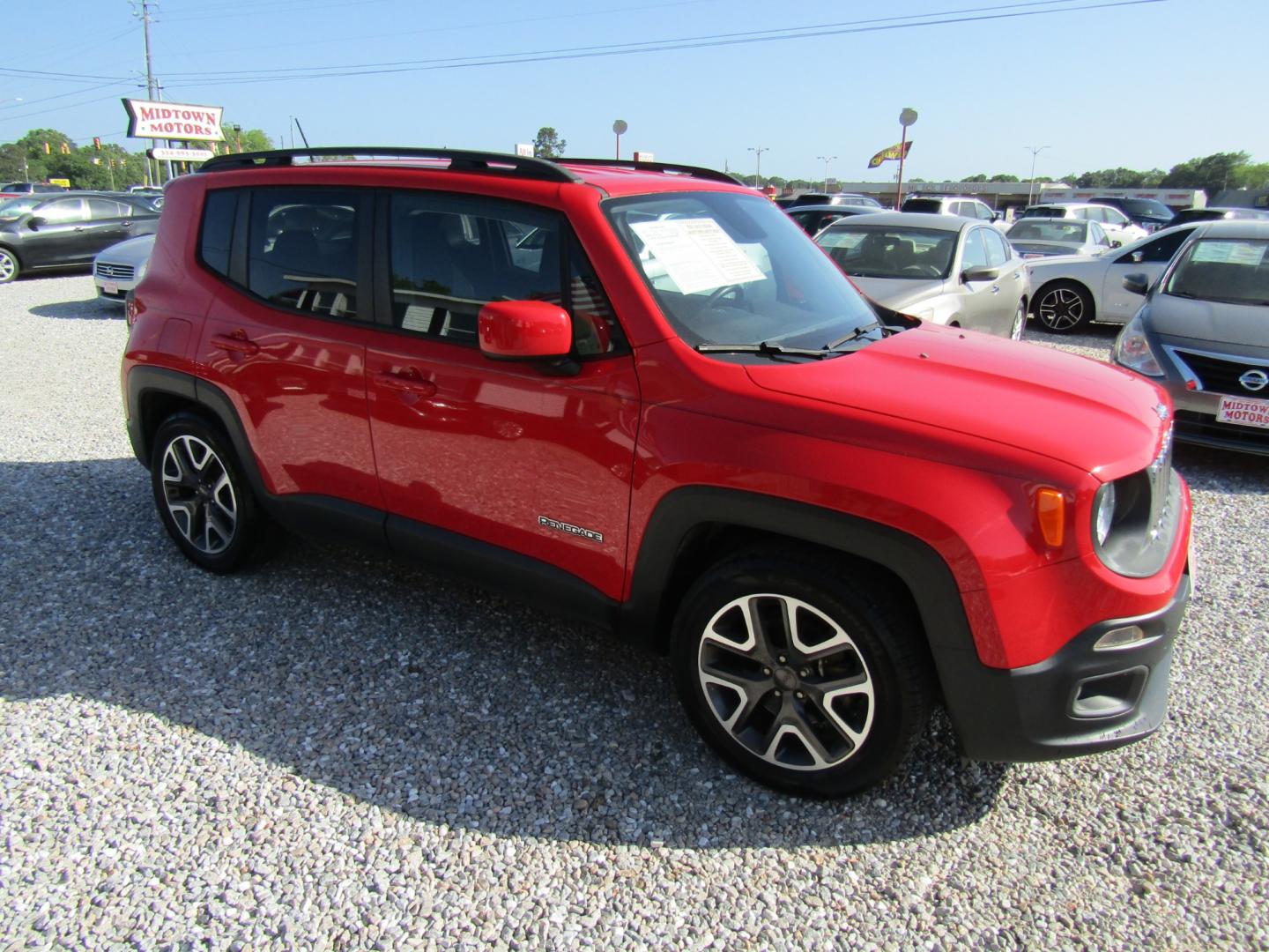 2016 Red /Gray Jeep Renegade Latitude FWD (ZACCJABT0GP) with an 2.4L L4 DOHC 16V engine, Automatic transmission, located at 15016 S Hwy 231, Midland City, AL, 36350, (334) 983-3001, 31.306210, -85.495277 - Photo#0